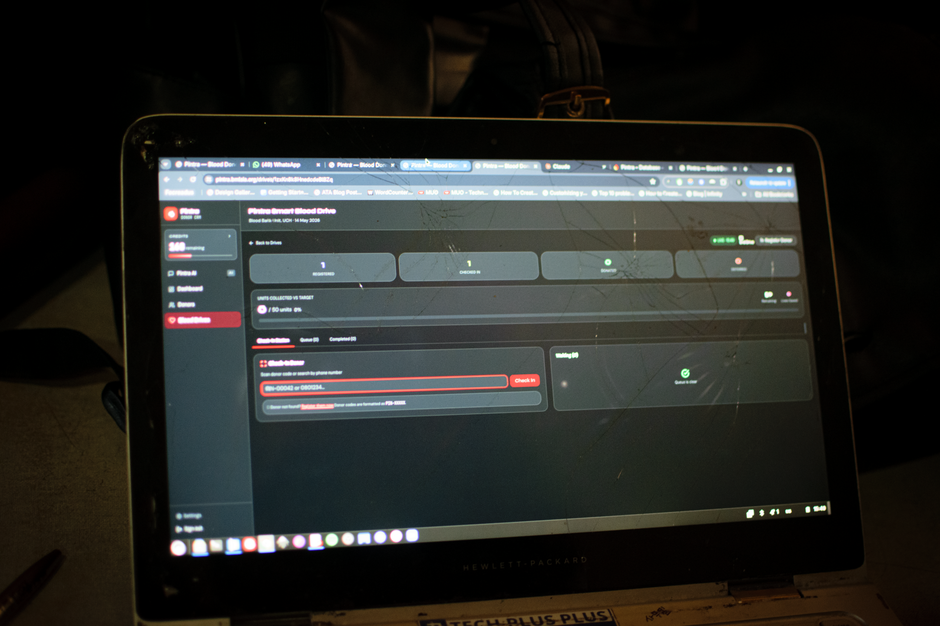 Pintra live impact dashboard on a laptop screen